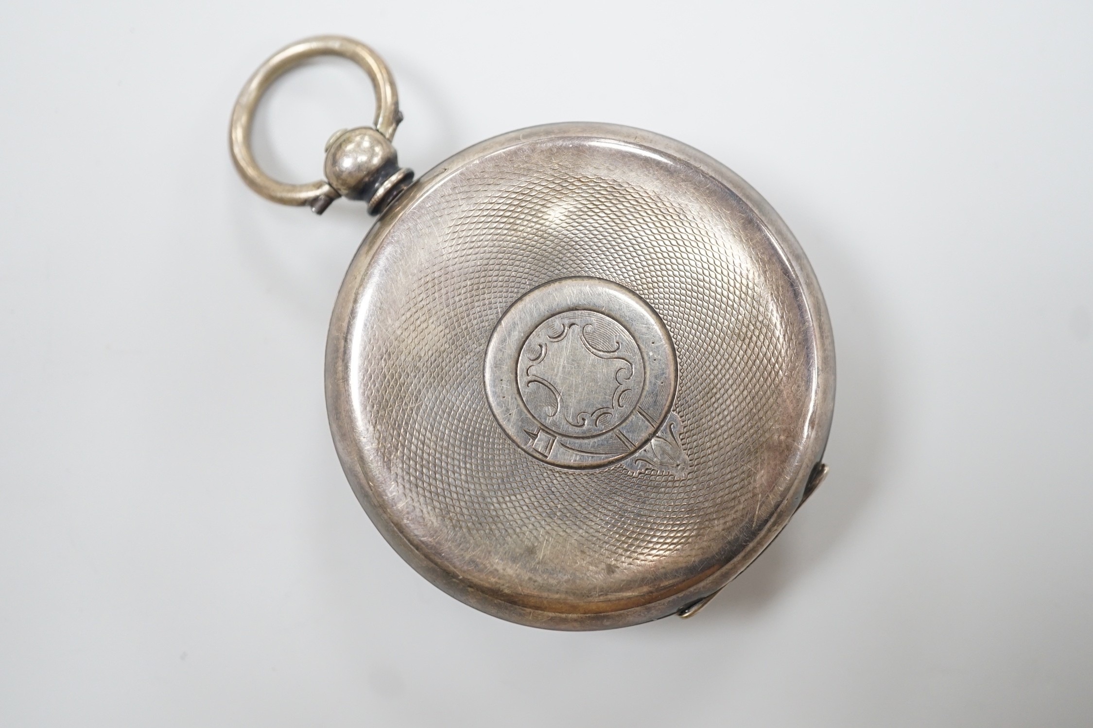 A Swiss open faced keywind pocket watch, retailed by Lovejoy, Wimbledon, with Roman dial and key.